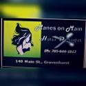 Manes on Main Hair Design company logo