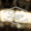 Luxe Garment Care company logo